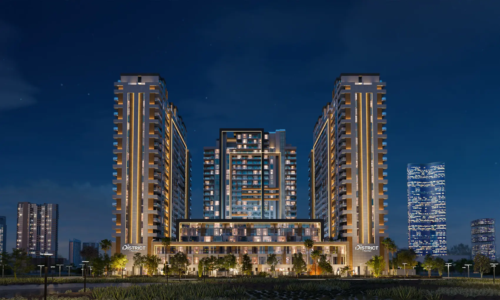 The District towers illuminated at night